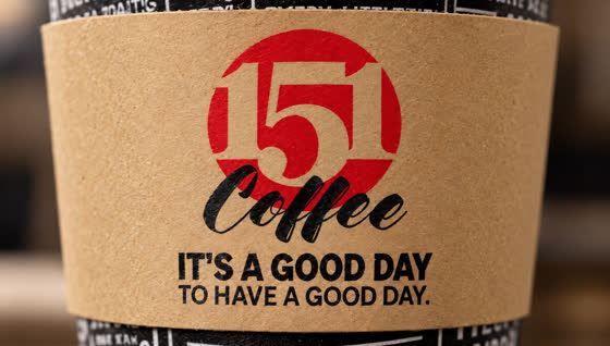The kraft cup sleeve with the 151 mark and the motto